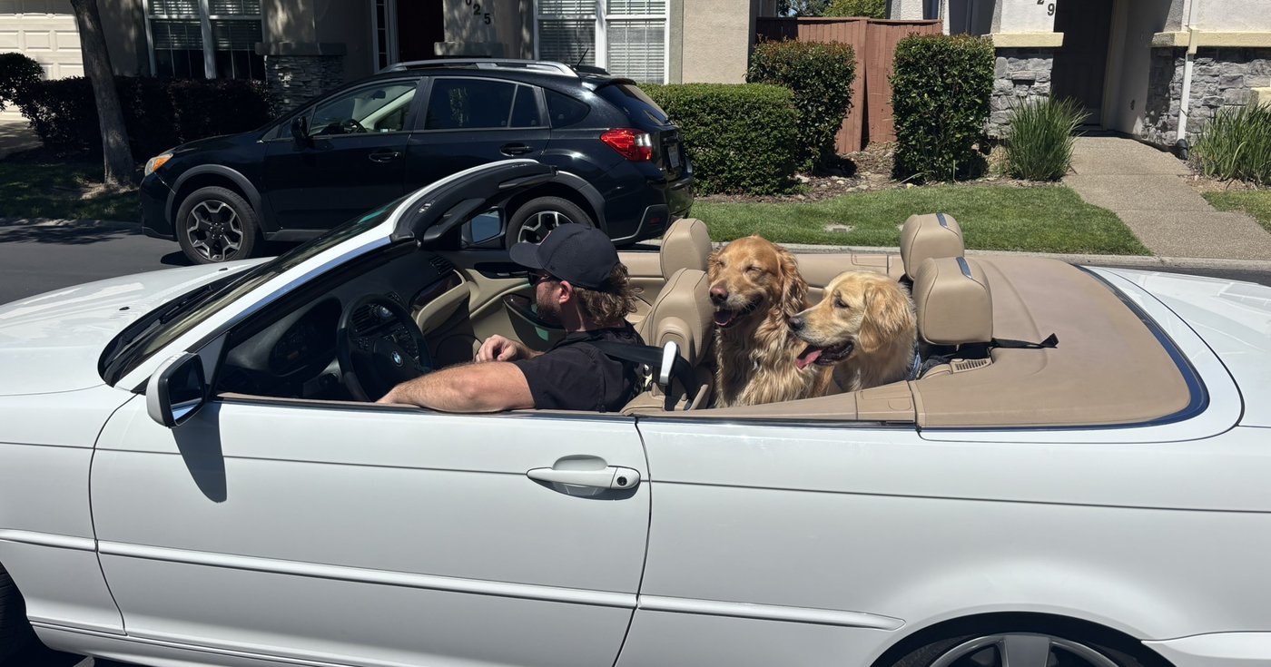 Pam, the 2005 BMW E46, with Tex and Cam in the back seat